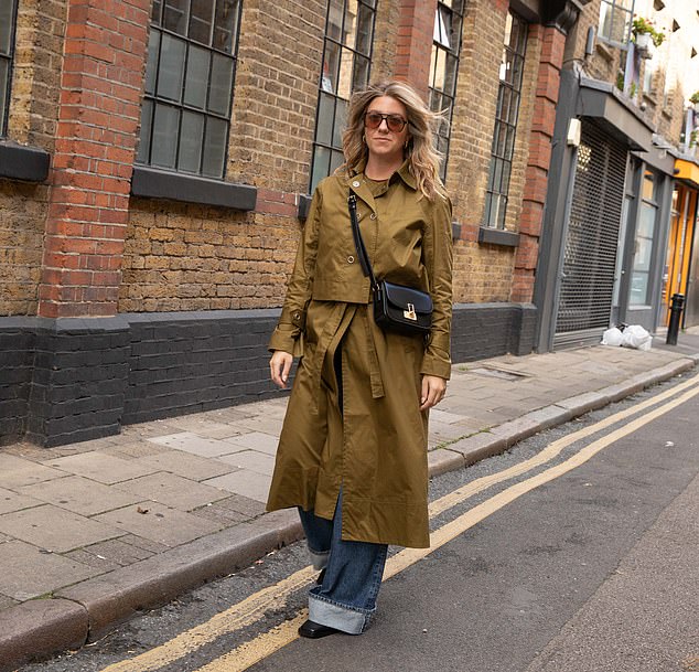 Sophie wears the French Connection convertible style as a classic trench coat, belted at the waist
