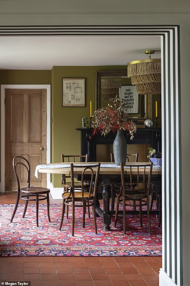 In the dining room the walls are painted Pickled Okra by johnstonespaint.com. The table and chairs are from Instagram seller @vintagefrenchfr. The rug is from Ebay