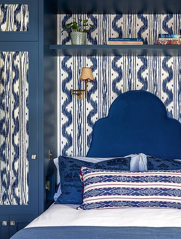 Loud prints are given cohesion with a palette of tonal blues in this bedroom designed by Barlow & Barlow